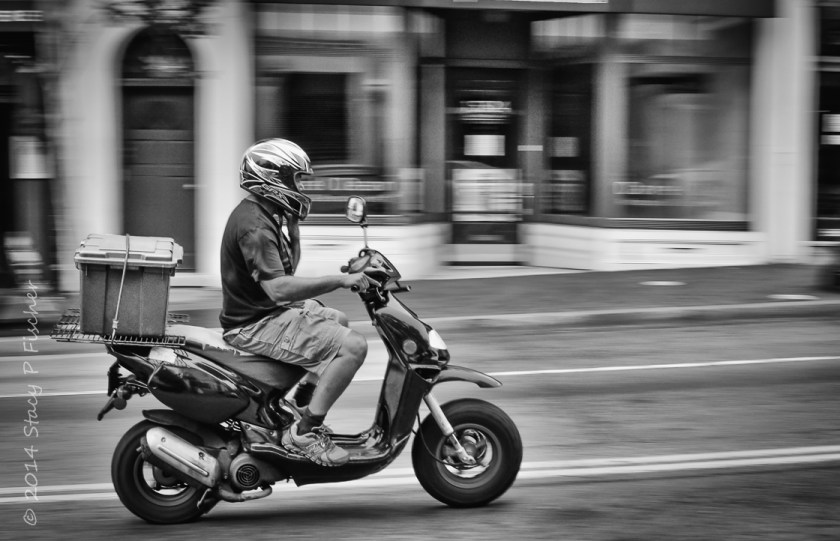 Movement of motorcycle caught via panning technique