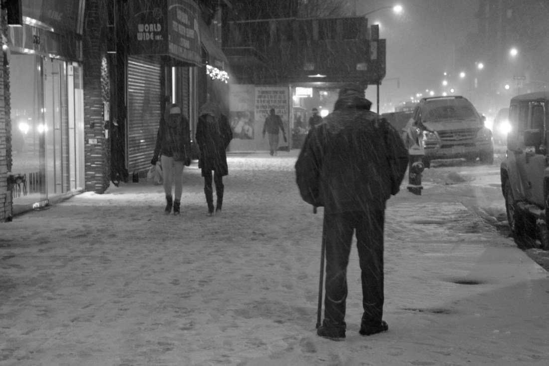 Snow falling on the Bowery