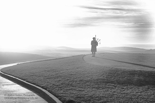 Bagpipe Player at Sunset