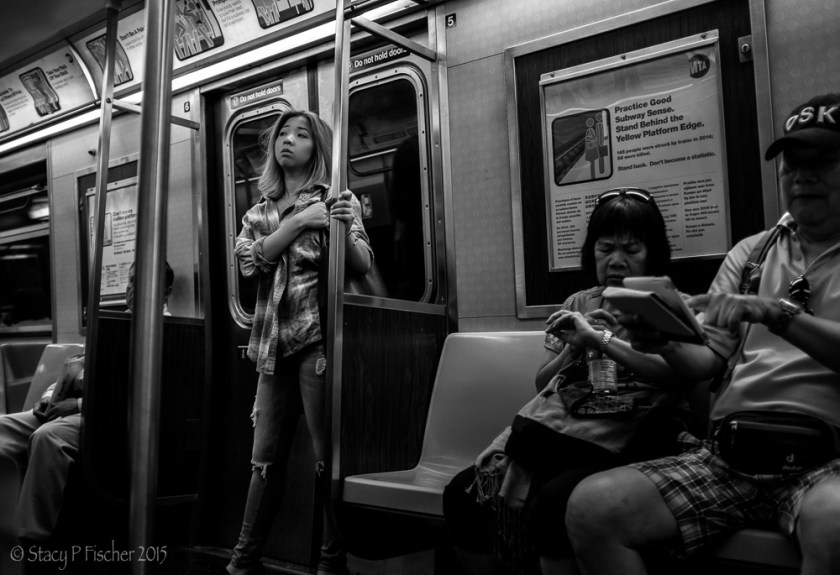 Wistful female passenger on New York City subway