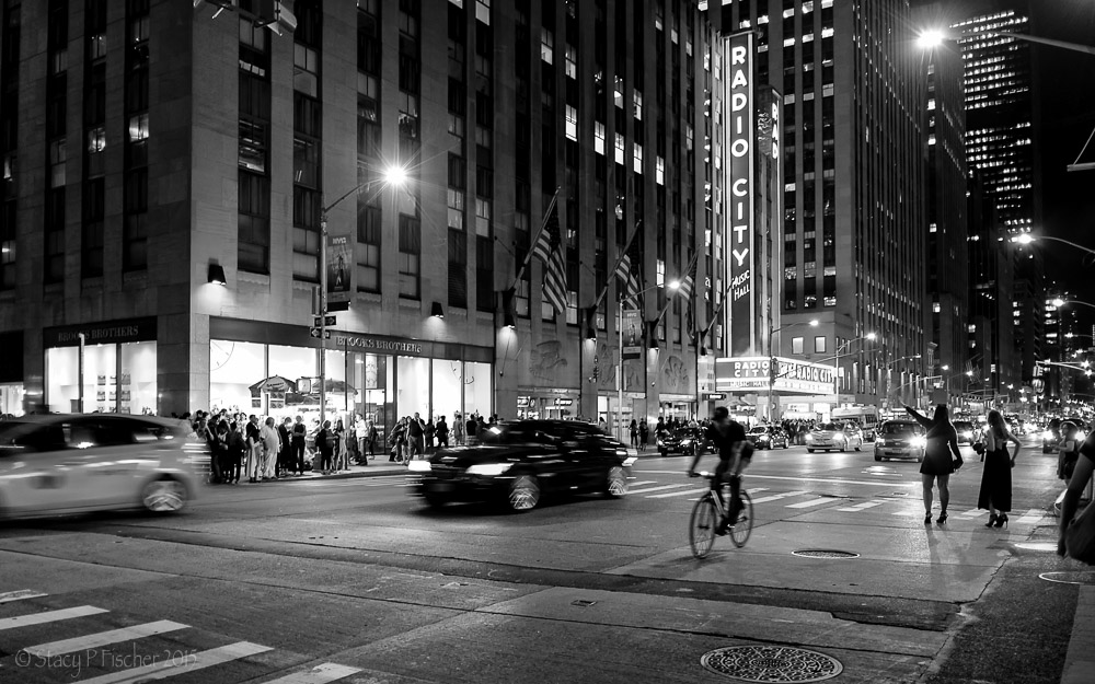 Street action after Radio City Music Hall show, Avenue of the Americas, New York City