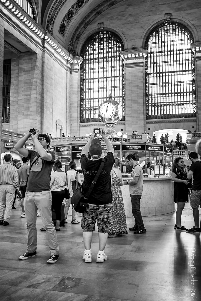 People photographing interior of Grand Central Station New York City