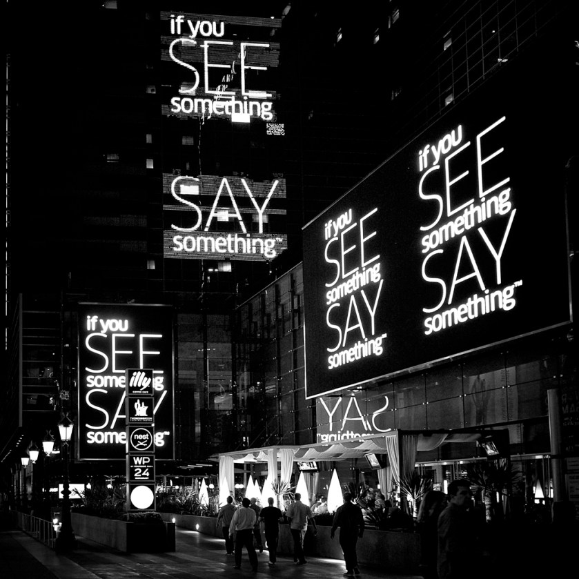 "See Something Say Something" signs at LA Live