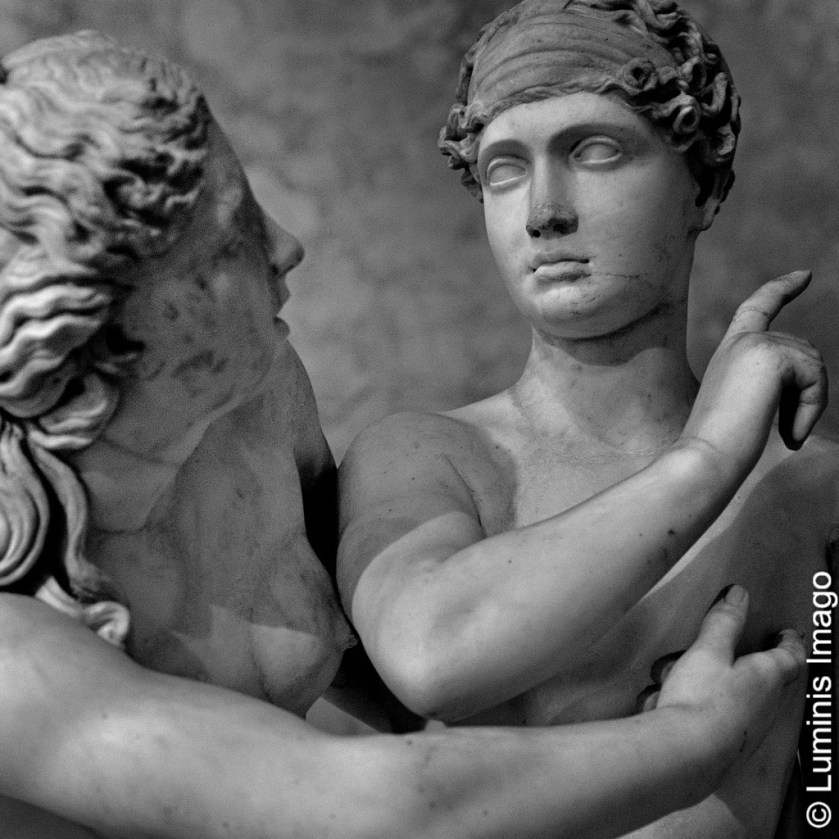 Black and white photograph of the ancient sculpture of Eros and Psyche showing love and despair